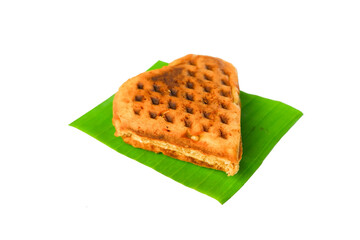 Tasty golden-brown waffle on a clean white background, perfect for breakfast or dessert