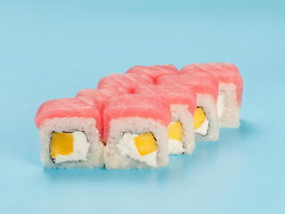 Philadelphia Roll of mango wrapped in tuna