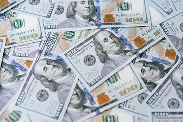 Pile of US One Hundred Dollar Bills Representing Wealth and Financial Success