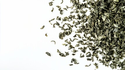 Green tea leaves scattered on white background, food photography, copy space, beverage