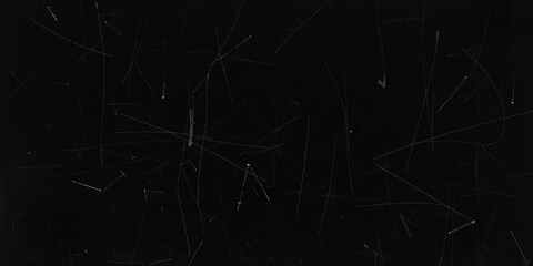 White dust and scratches creating a gritty texture on a black background resembling dirt on glass, vintage, texture