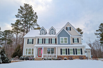 Colonial style luxury home in the winter