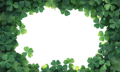 Green clover leaves forming a frame on a transparent background with copy space