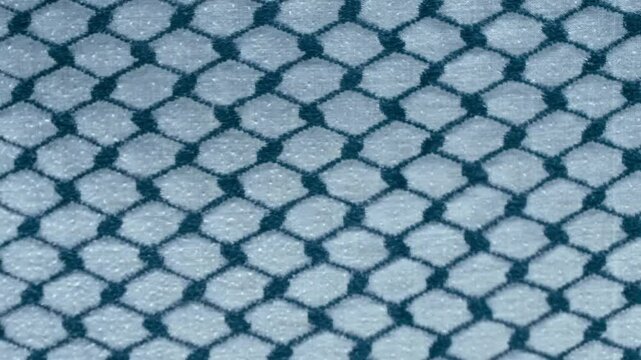 Arabic patterned fabric (arafatka) flutters in the wind. Closeup. Macro
