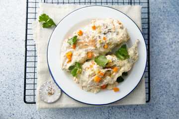 Rabbit with sour cream sauce