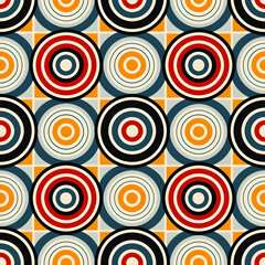 Fototapeta premium A colorful geometric pattern featuring concentric circles and squares.