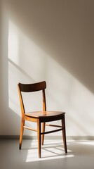 Fototapeta premium Solitary Wooden Chair Casting Shadows in Bright Room