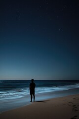 Person on Beach at Night