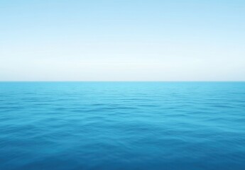Fototapeta premium Tranquil and Calm Blue Ocean Surface with Clear Sky and Gentle Waves Under Natural Light