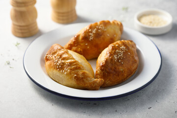 Traditional Russian pies with sesame seeds