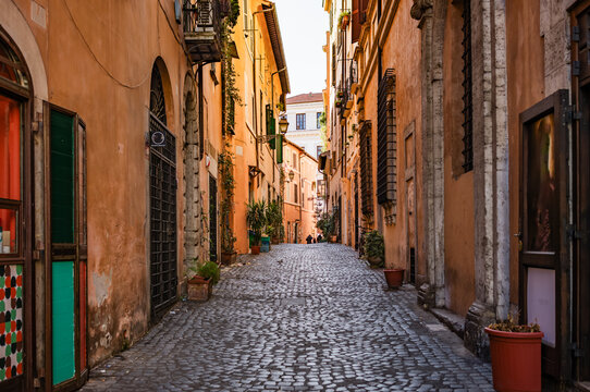 Alley paved with cobblestone in the old town, Rome, Lazio, Italy