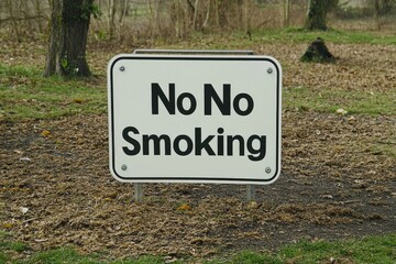 No Smoking Sign in a Park or Woods Setting