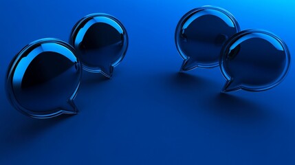 Four reflective speech bubble icons arranged on a solid blue surface communication concept