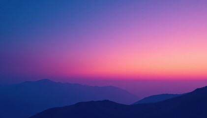 Fototapeta premium Gradual transition from blue to purple in a cloudless sky at sunset, atmospheric, serene