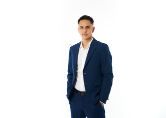 Businessman posing with hands in pockets in studio photo shoot