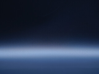 abstract blue background with some smooth lines in it and some reflections