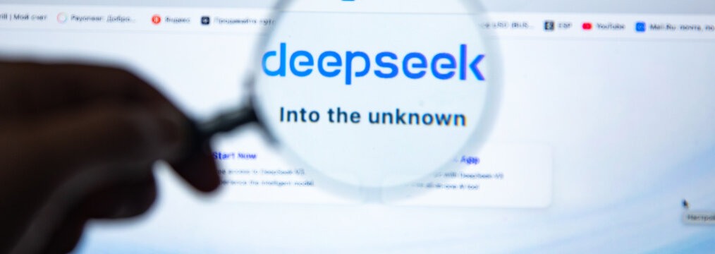 man holding a magnifying glass on deepseek