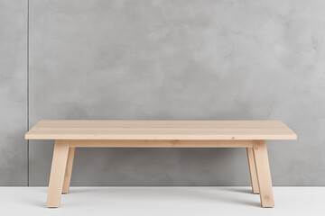 Minimalist wooden coffee table against gray wall | Light natural wood with clean lines, ideal for modern interiors | Scandinavian furniture design inspiration.