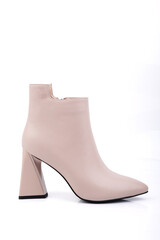 Beige leather women's ankle boots with heels. Women's boots for an elegant look.