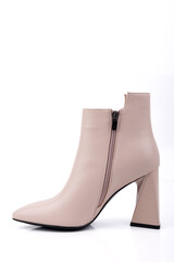 Beige leather women's ankle boots with heels. Women's boots for an elegant look.
