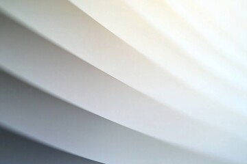 Obraz premium Abstract close-up of softly curved paper layers in gradient tones, ideal for backgrounds or textures