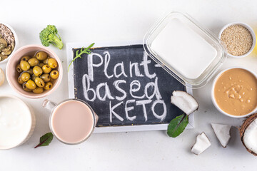 Plant based keto food background with low carb vegan keto diet ingredients, healthy vegetarian fat...