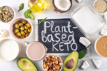 Plant based keto food background with low carb vegan keto diet ingredients, healthy vegetarian fat...