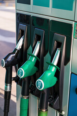 Green Petrol pumps  on petrol station 