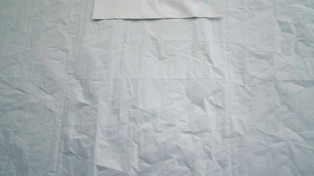 Background texture crumpled white paper. 4k Video. generated with AI