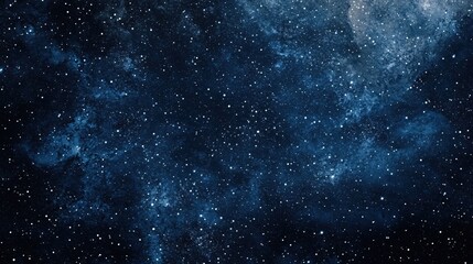 Deep blue cosmic sky with bright stars and nebula in a dark space background texture