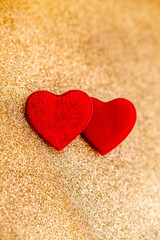 Fototapeta premium Heart symbol on a gold shiny background 