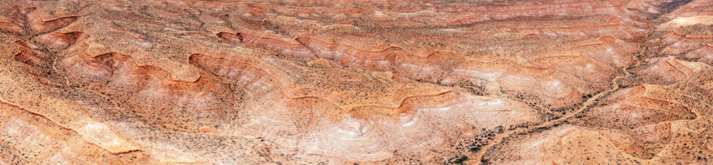 Panoramic red wild sandstone landscape with cliffs. Drone Aerial view