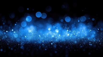 Abstract blue bokeh lights shimmering against a dark background, creating a dreamy atmosphere