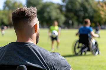 An individual in a wheelchair watches an adaptive soccer game, showcasing the spirit of inclusion and community in sports, emphasizing resilience and determination.