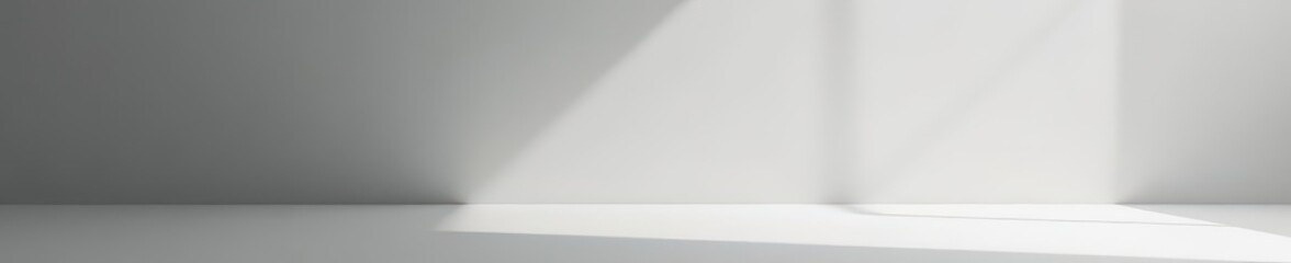 Sleek gray and white studio setting, ideal for product shots, smooth, elegant, empty