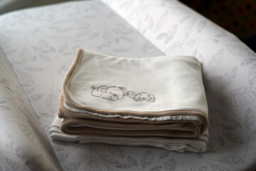 Baby blanket with animal pattern.