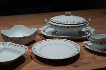 Old porcelain dinner service. White with a floral pattern.