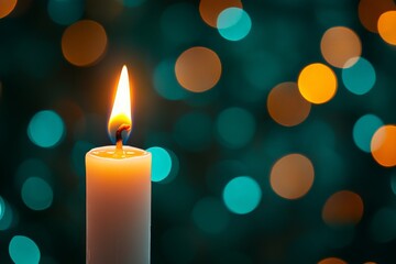Candle flame illuminating a serene background of colorful bokeh lights in a cozy atmosphere