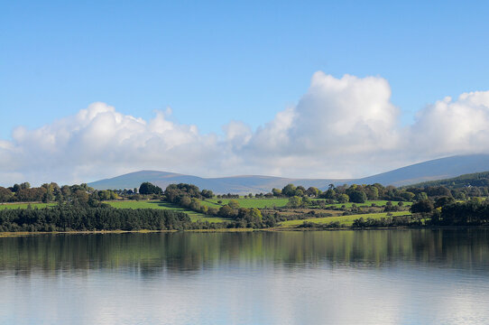 Blessington Lakes , County Wicklow,Ireland .This is a manmade lake after the valley was flooed to facilitate a hydroelctric dam. there are a nuber of Rowing and sailling clubs on the waterfront .
