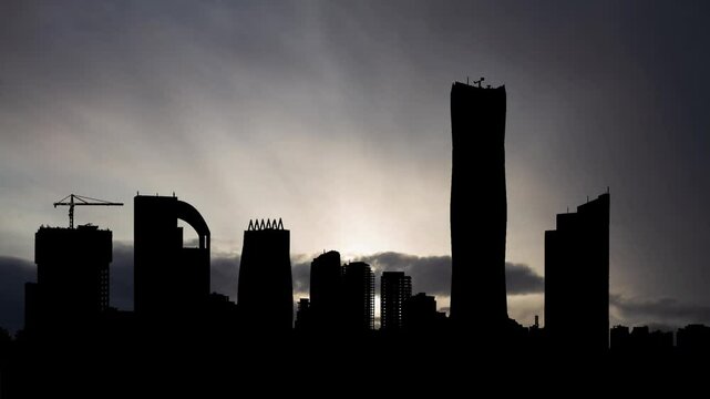 Addis Ababa Skyline, Time Lapse at Sunrise with Fast Clouds and Dark Silhouette of Skyscrapers, Ethiopia, Africa
