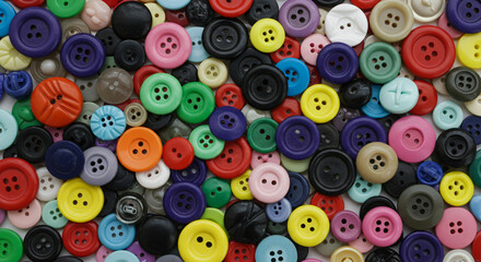 A colorful assortment of buttons in various sizes and colors scattered randomly.