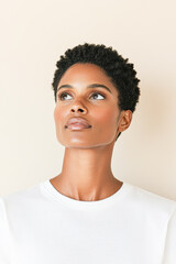 Elegant portrait of a woman gazing upward studio setting fashion