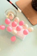 Small bright homemade Easter eggs are ready for decorating Easter cakes by it. Selective focus. Happy Easter concept. Process of cooking at home