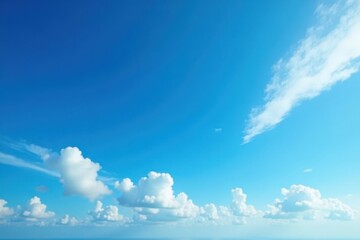 Deep azure expanse, scattered cirrus clouds streaking across , open, overhead