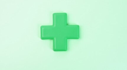 Obraz premium A close-up image of a green cross symbol, prominently displayed against a clean white background. 