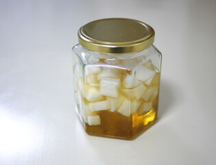 六角形のガラス瓶に漬けた はちみつ大根の写真素材