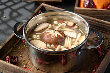 Mini hot pot mushroom soup base