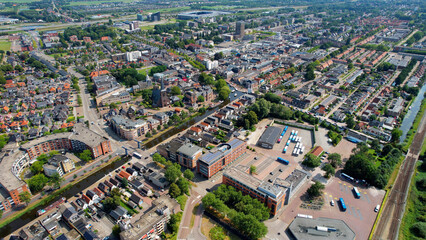 Aerial view around the old town of the city Heerenveen on a sunny day in Netherlands.