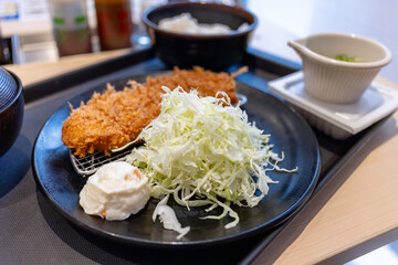 Japanese Breakfast. Fried Chicken with Salad, Rice and Sause. Miso Soup