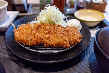 Japanese Breakfast. Fried Chicken with Salad, Rice and Sause. Miso Soup